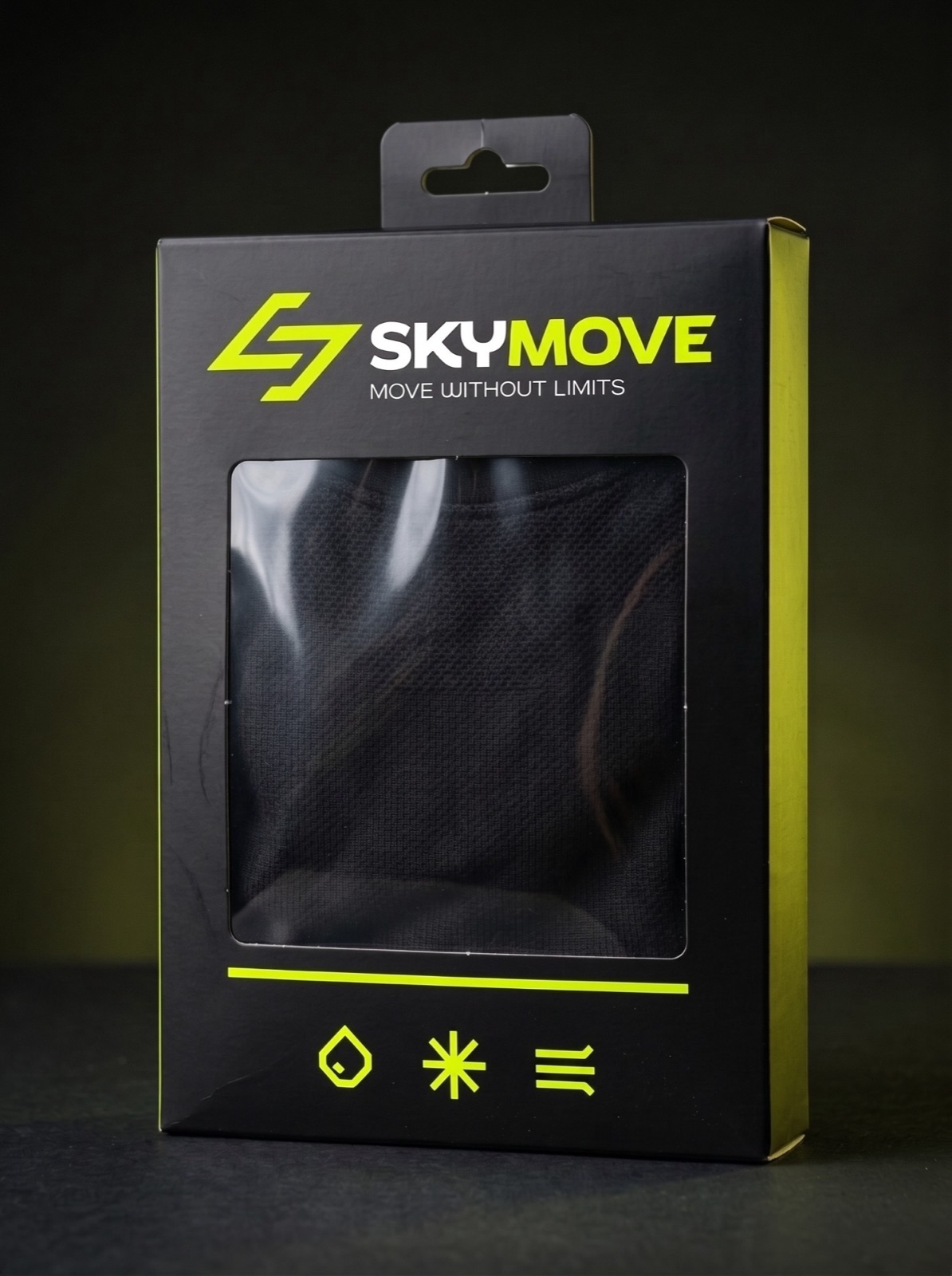 A black box for a thermal baselayer with a window, a lime line and three icons