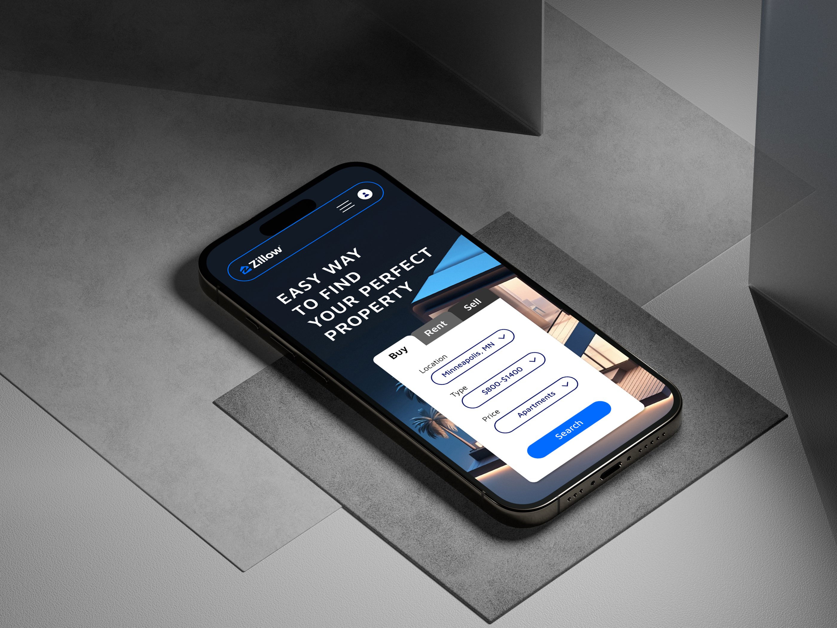 The redesigned Zillow on a phone lying on concrete